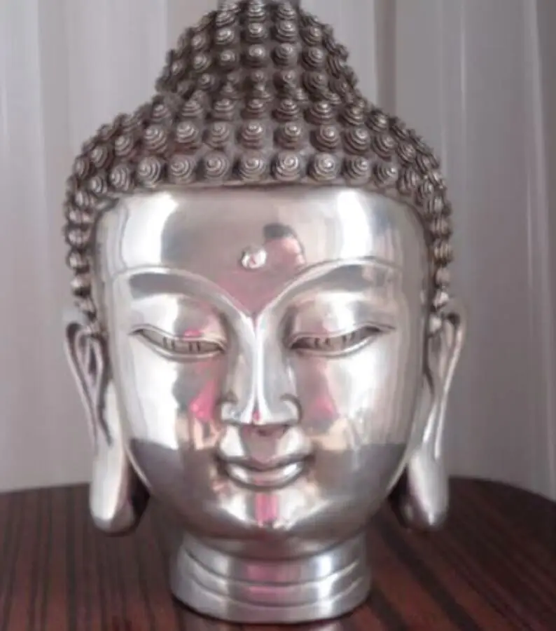 

Tibetan silver Buddhis shakyamuni bronze buddha head statue