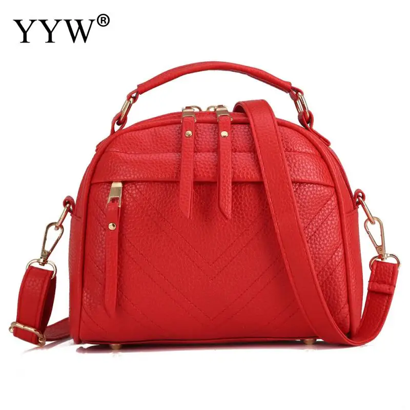small red bolsa with handle