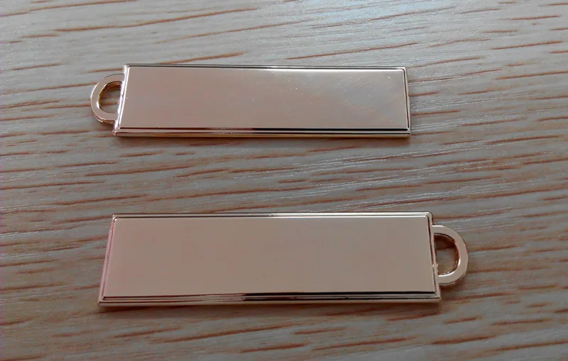 

Customized Garment Metal Labels Zipper Accessories Zinc Alloy Metal Sliders Fashion Plating Pullers Chain Keychain Keyring