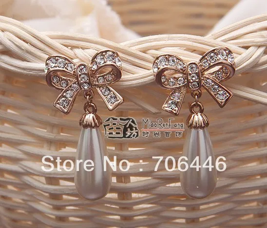 

Rose Gold Tone Clear Rhinestone Crystal Water Drop Cream Pearl and Bow Design Stud Earring