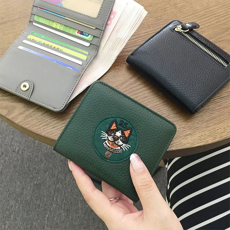 

Leather short wallet female new leather two fold small wallet thin card position purse simple fashion