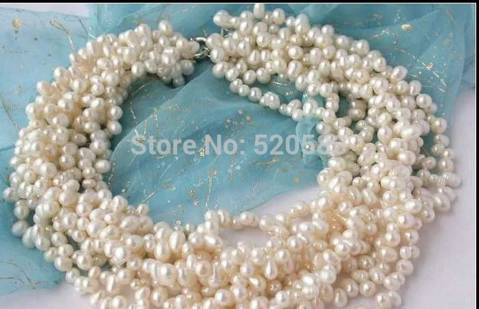 

10ROW 7MM 17" WHITE RICE FRESHWATER PEARL NECKLACE AAA