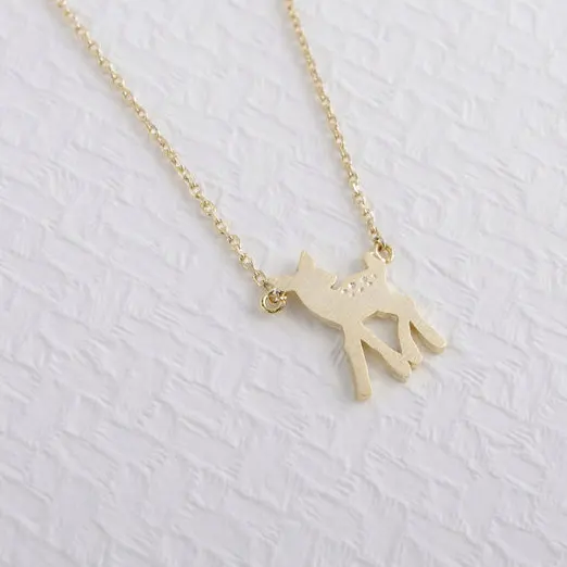 

Wholesale New Trendy Gold And Silver Personalized Bambi Necklace High Quality Hunger Games Pendant Necklace Women Best Friend