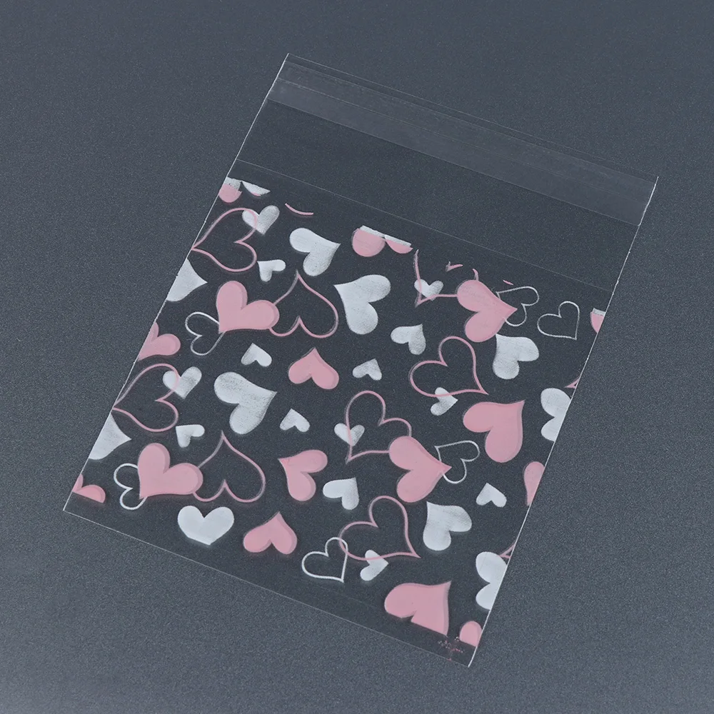 

100Pcs/Pack Heart Print Pattern Self Adhesive DIY Cookie Candy Package Plastic Food Bags Candy Christmas Party Gifts Bag