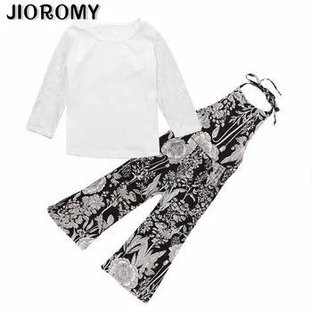 

The new summer 2019 children in Europe and the ins style white top + system with printed pants suit