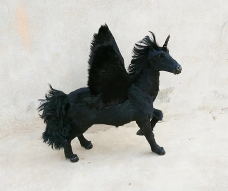 black stuffed unicorn