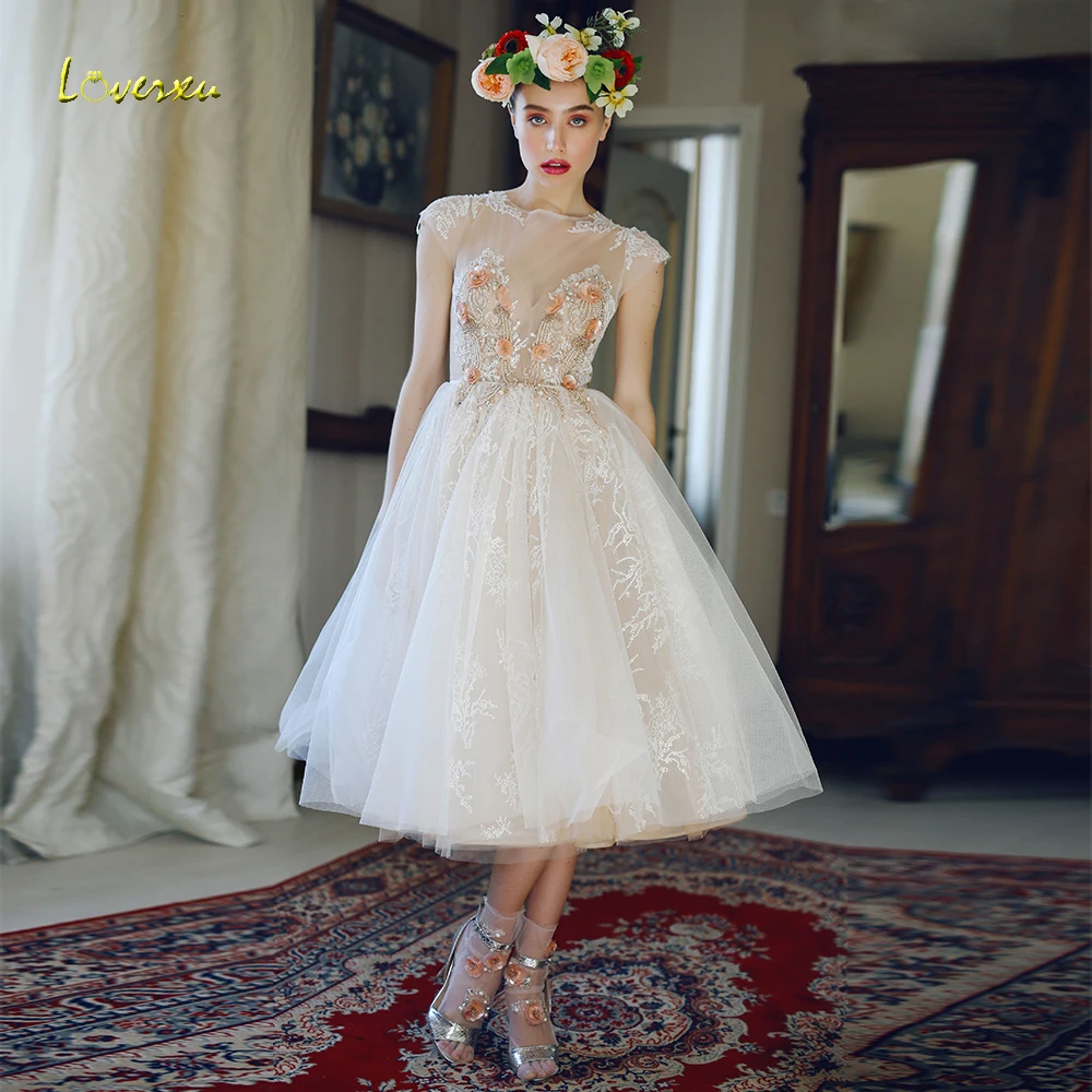

Loverxu Scoop A Line Graduation Dress Delicate Appliques Pearl Beading Cap Sleeve Backless Organza Tea-Length Homecoming Dresses