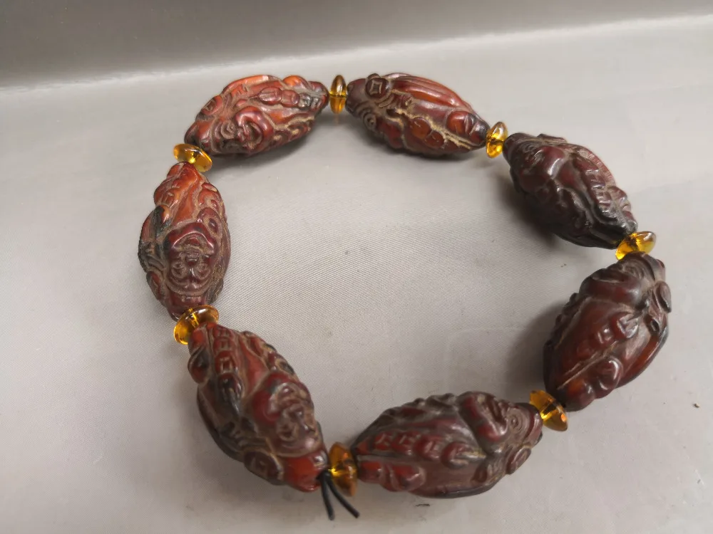 

Tibet natural yak horn Carving into a Buddha head Bead hand String Bracelet