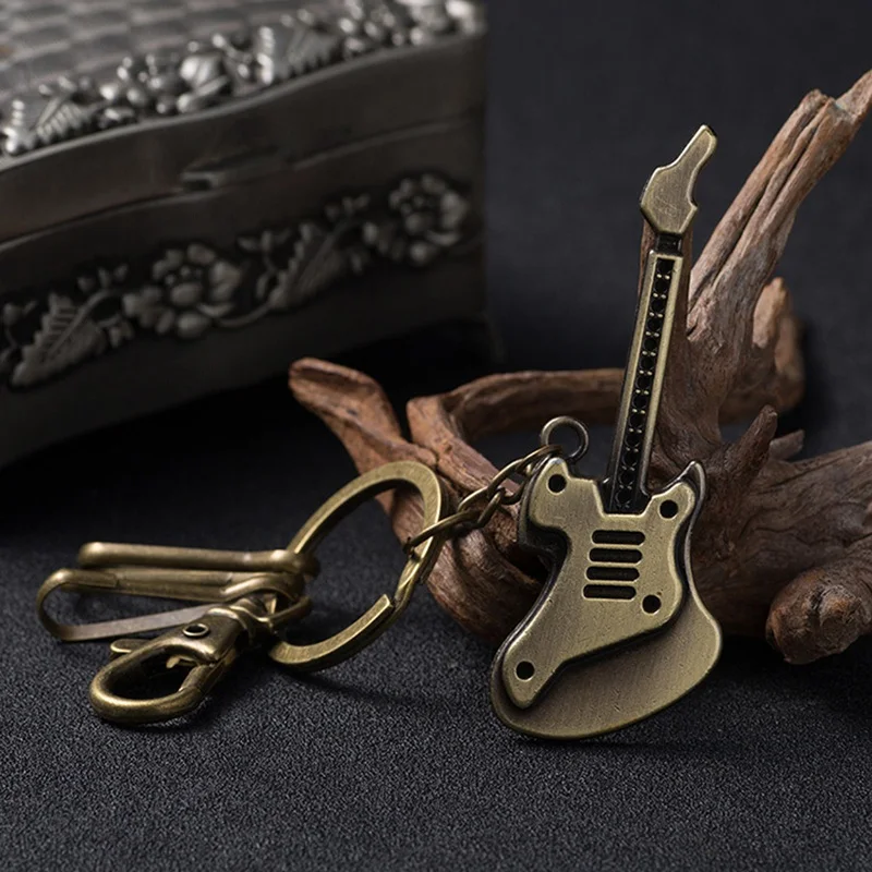 

2018new arrive Fashion car keychain many styles guitar Keychain pendant Trinket Key Chain Jewelry Souvenirs Gift Men/women