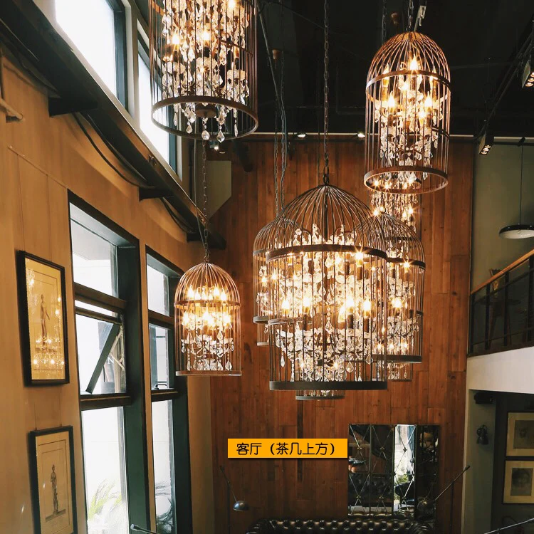 Baratos Desván americano hierro retro pájaro jaula colgante luz cristal hotel vestíbulo luz restaurante lámpara villa escaleras luces colgantes