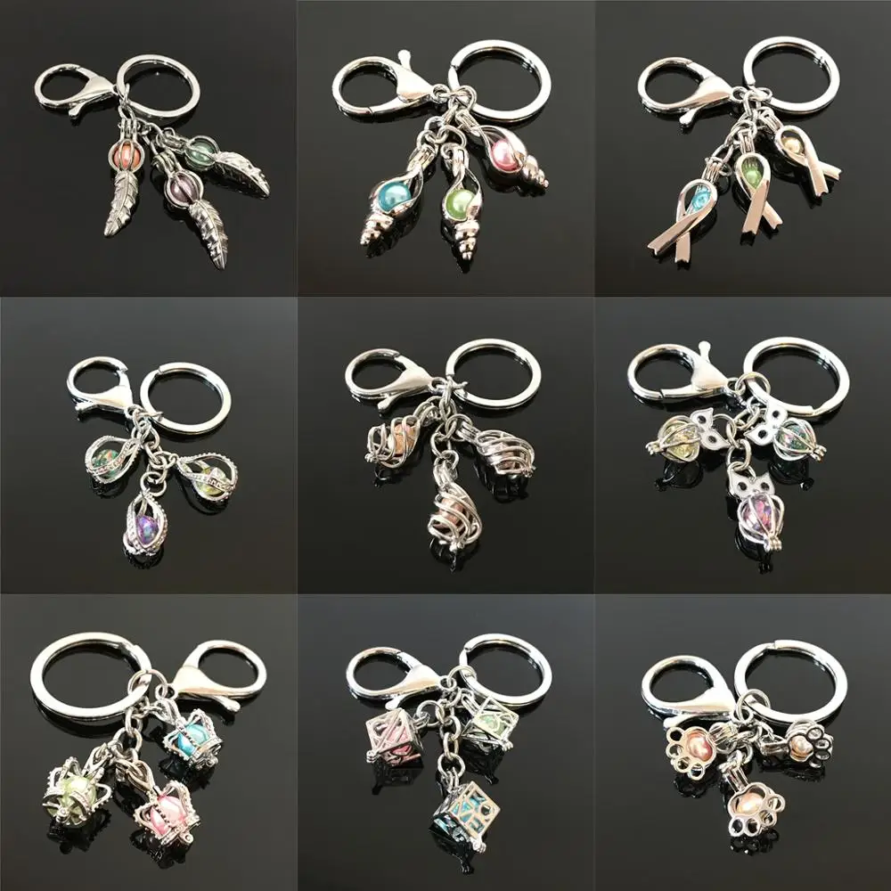 

More Style Twist Feather Pearl Cage Beads Cage Key Chain DIY Locket Pendant Key Rings Essential Oil Diffuser Jewelry Charms Gift