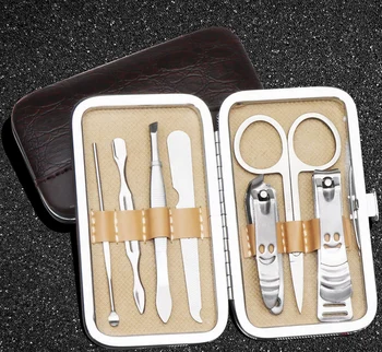 

by dhl or ems 50sets 7pcs/set Nail Clipper Kit Nail Care Set Pedicure Scissor Tweezer Knife Ear pick Utility Manicure Set Tools