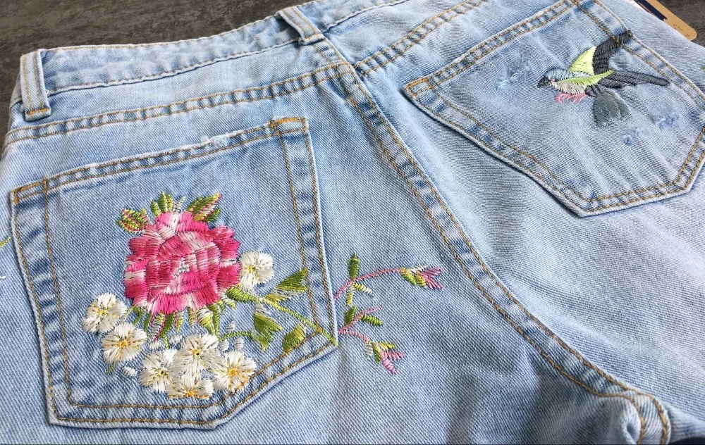 2017 Europe and the United States women's 3D three-dimensional heavy craft bird flowers front and rear side embroidery high waist straight irregular wear jeans (24)
