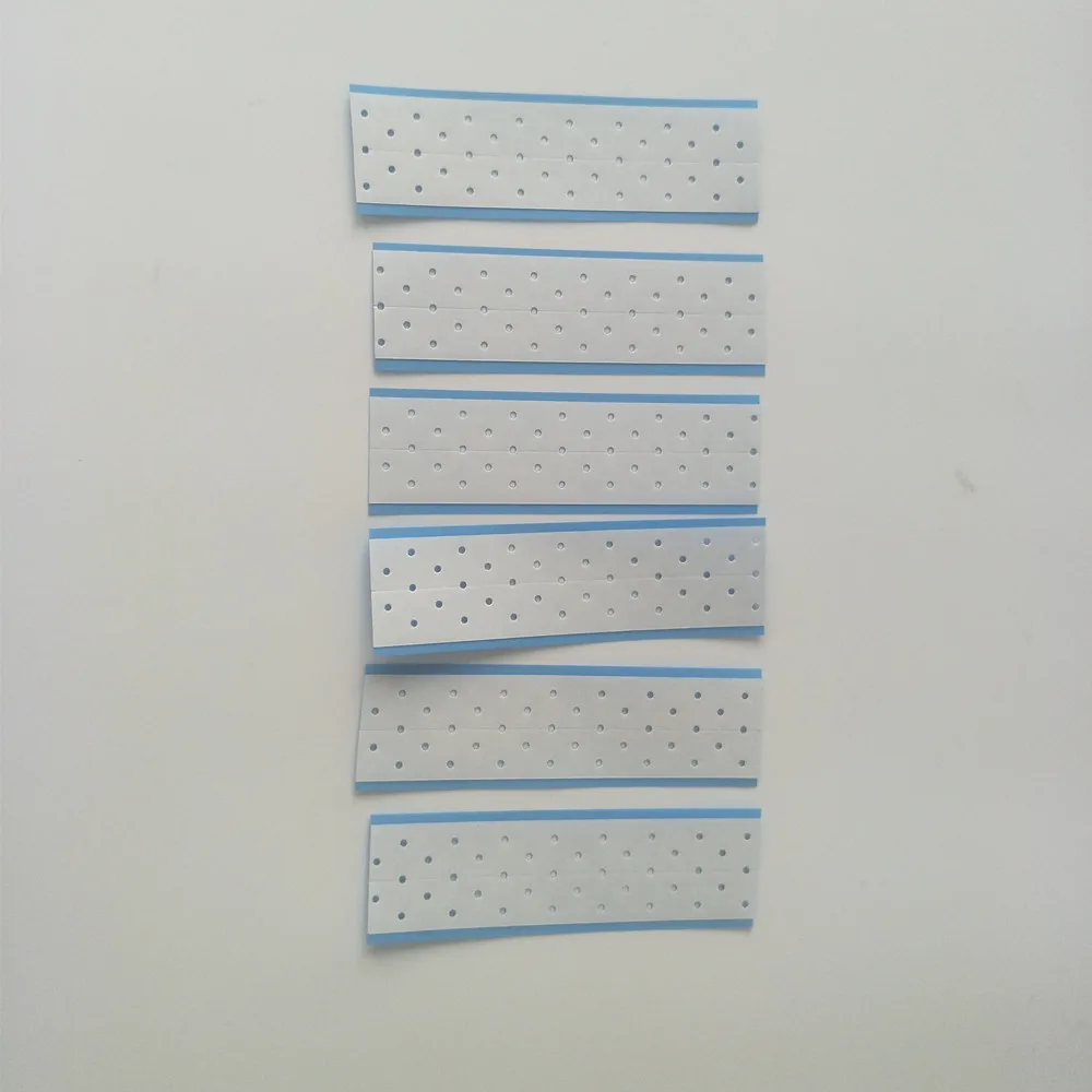 

Tapes for attaching hair pieces hair system with ventilation holes 6pcs per pack