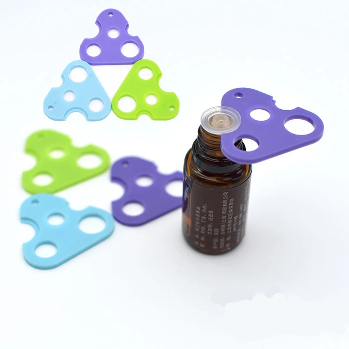 

Essential Oil Opener Key Tool Remover For Roller Balls and Caps Bottles Plastic Opener Roller Bottle Corkscrew Tool