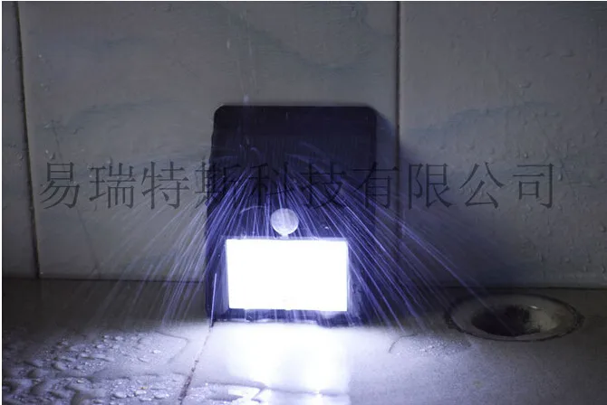 120 conjuntos un lot fedex / DHL rapide solaire à détecteur de mouvement infrarouge Ray Motion Sensor lampe de mur de lumière avec 4 LED