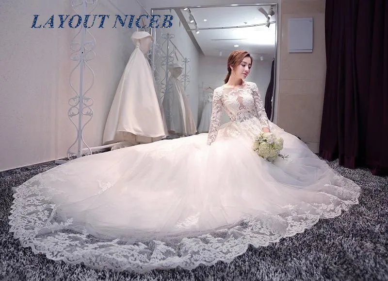 

Sexy Open Back vestido de noiva Ball Gown Wedding Dress 2019 Long Sleeve Lace Appliques Robe de Mariee Casamento