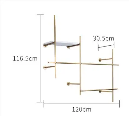 Clothing store display stand. Wall-hung in The Wall. Women's clothing store simple wrought iron gold. Side hangers.