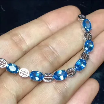 

KJJEAXCMY fine jewelry 925 Pure silver with natural blue topaz bracelet jewelry gold and silver color.