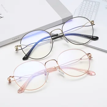 

Retro metal glasses frame Two-color foot silk design literary round frame glasses frame Trendy women's decorative flat mirror.