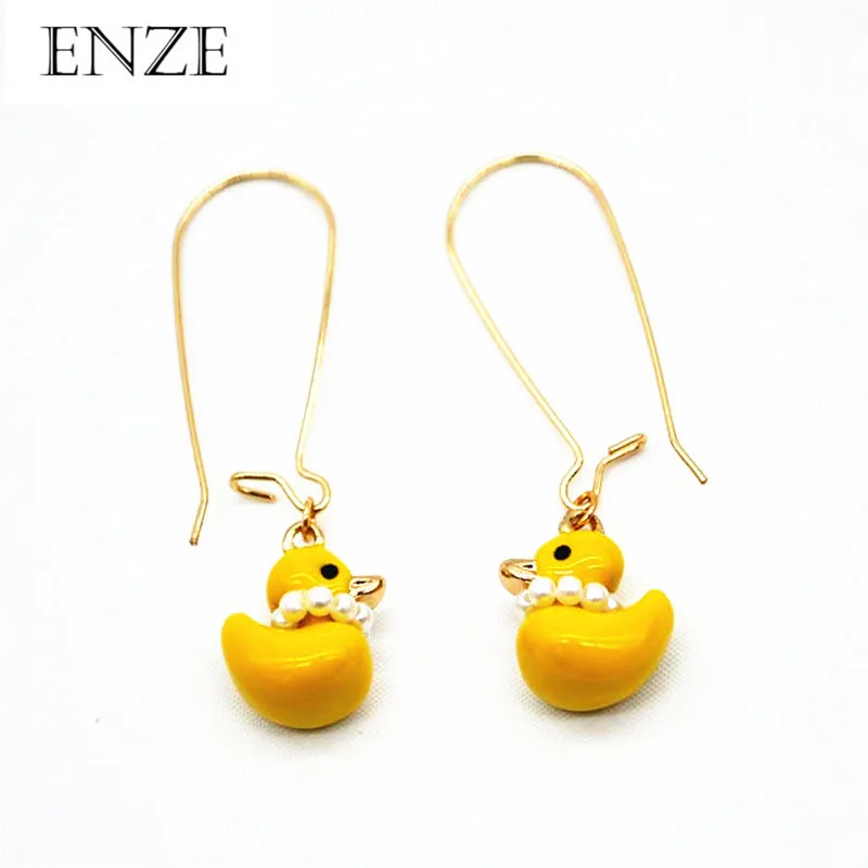 

Free shipping ladies fashion zinc alloy jewelry Yellow enamel drops glaze ducks cartoon long earrings cute fashion 2017 new