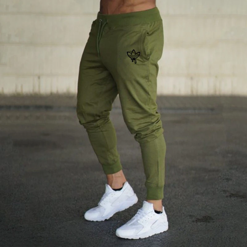 Koop Merk 2018 NIEUWE Heren Joggers Broek Fitness Casual Mode Merk Joggers Joggingbroek Bodem Snapback Broek Mannen Toevallige Elastische Broek