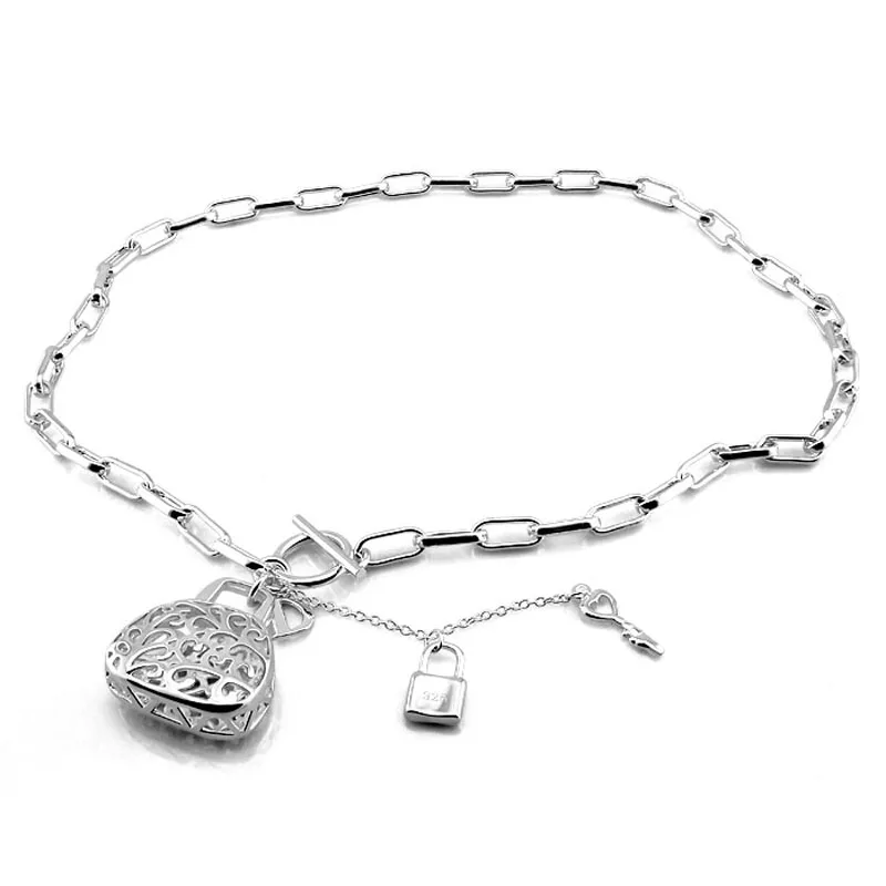Fashion and personality bag pendant necklace.Women solid 925 silver key