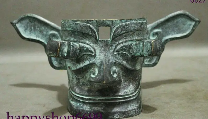 маски демонов тибета. китайские бронзовые маски. китай саньсиндуй. маски саньсиндуй китай. династия чжоу артефакты.