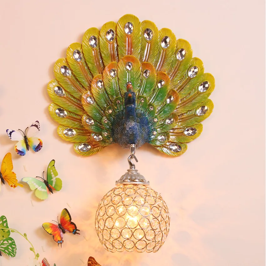 

Southeast Asia fashion creative peacock crystal wall lamp Nordic bedroom bedside living room TV background wall lamp 220V led