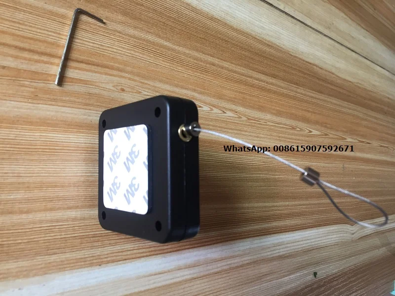 security_display_pull_box_recoiler_for_ring_jewelry_glasses_merchandise_anti_theft