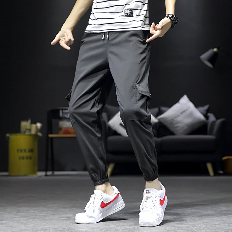 

Tread Men Cargo Pants Elastic Waist Multi-Pockets Mens Pants Patch Designs Pockets Casual Pants Men Pantalones Hombres