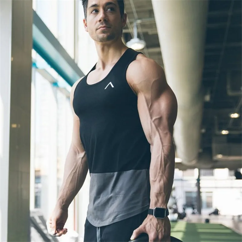 

2019 New spring and summer leisure fashion running training cotton stretch stitching sleeveless quick dry sweat absorbent vest