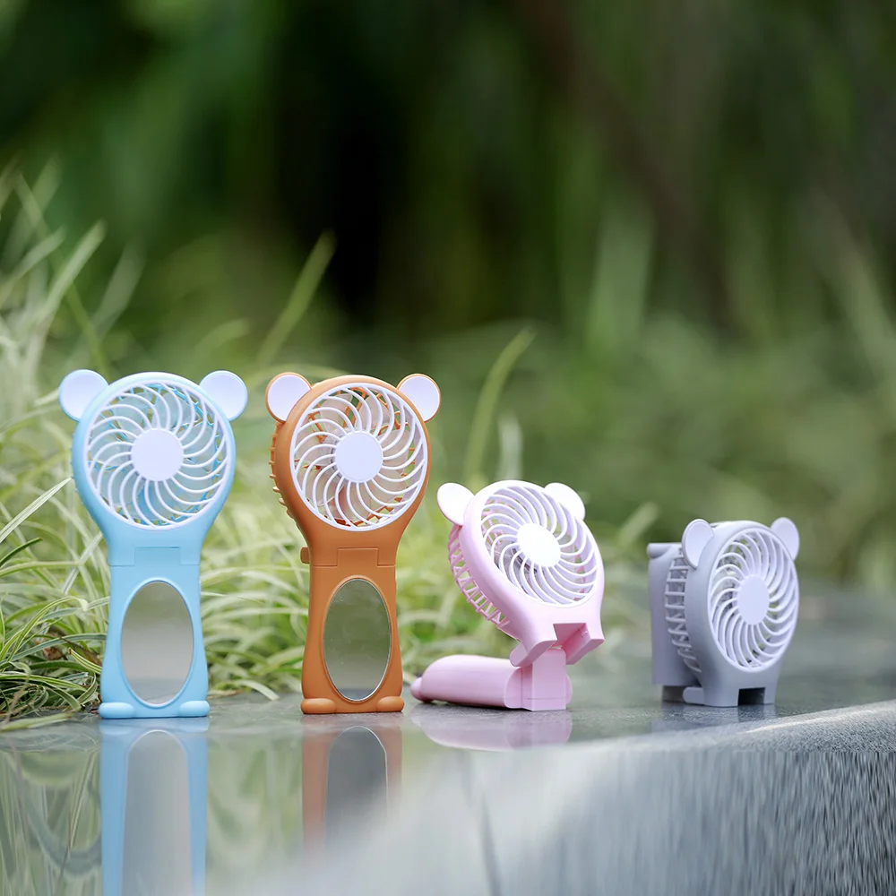 

Miniature portable handheld mirror ultra quiet fan rechargeable lithium battery portable handheld Mini USB cute cartoon fan