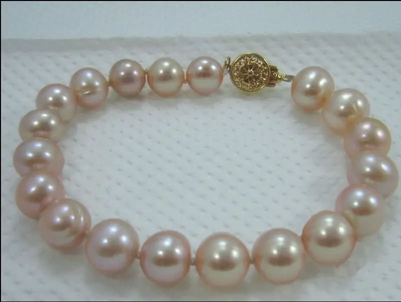 

Free shipping >>>>>>hot Gorgeous AAA+10-11 MM PINK SOUTH SEA PEARL BRACELET 14KGP clasp 7.5-8