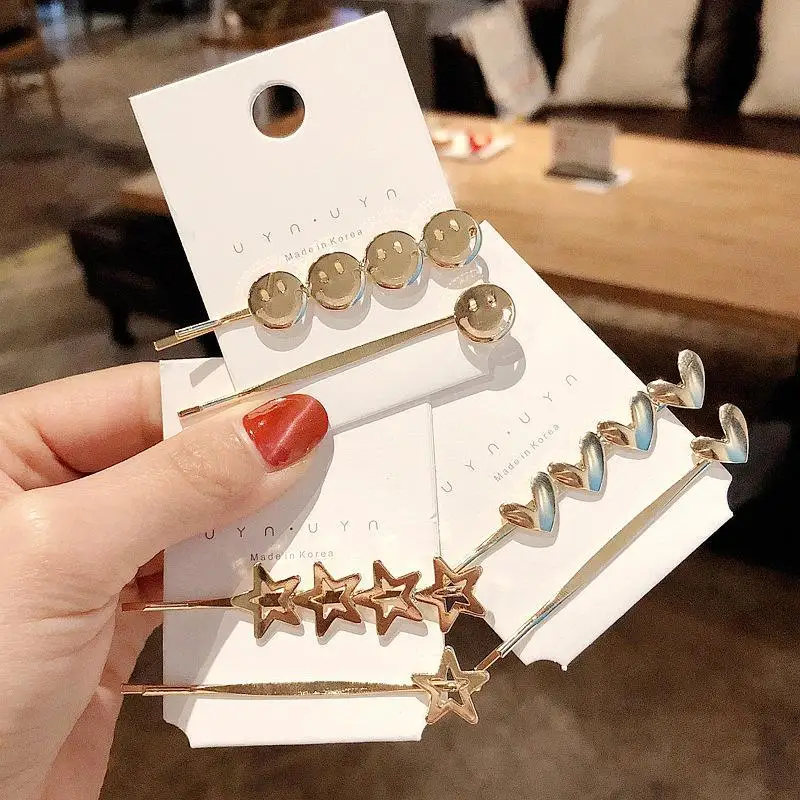 

Korea Simple Fashion Metal Heart Five-pointed Star Smiley Wild Word Clip Exquisite Liu Seaside Clip Bridal Headdress For Women