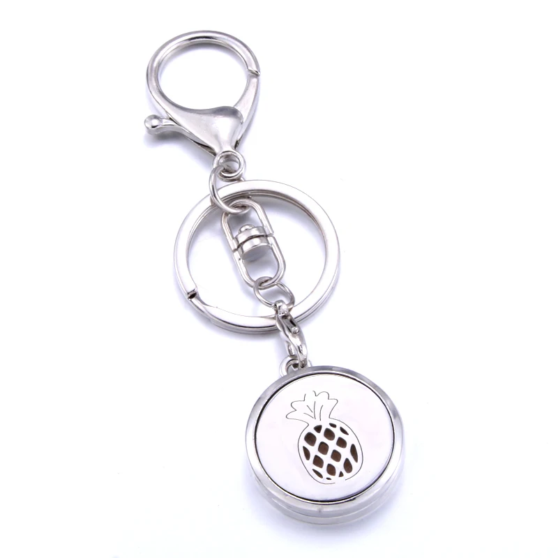 

Exquisite Pineapple pattern Aromatherapy Box Can Open Pendant Keychain Female Fashion Jewelry Wholesale Suitable for cars