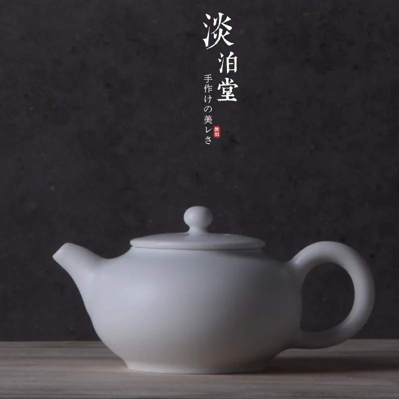 

Mr. Qing Japanese lanolin white glaze small teapot simple Zen style retro Xishi kettle kung fu tea set can be determined LOGO