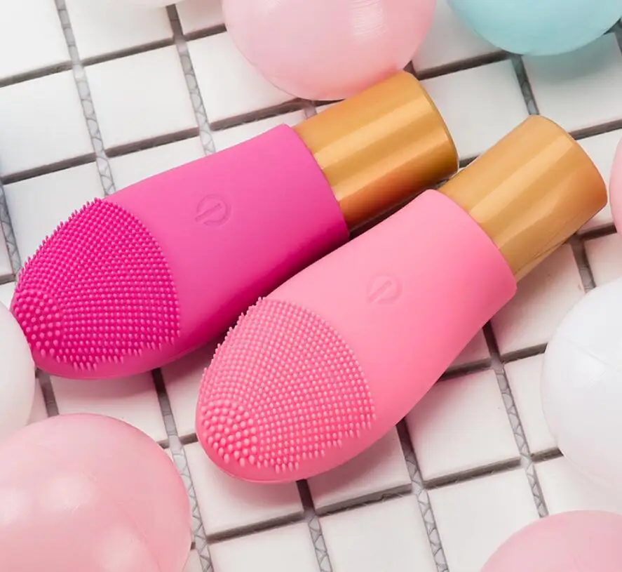 

New waterproof silicone cleansing instrument mini electric ultrasonic beauty instrument pore cleaner