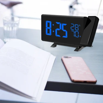 

Rotating projection digital LED clock Temperature/hygrometer clock FM radio electronic clock desktop Curved screen alarm clock