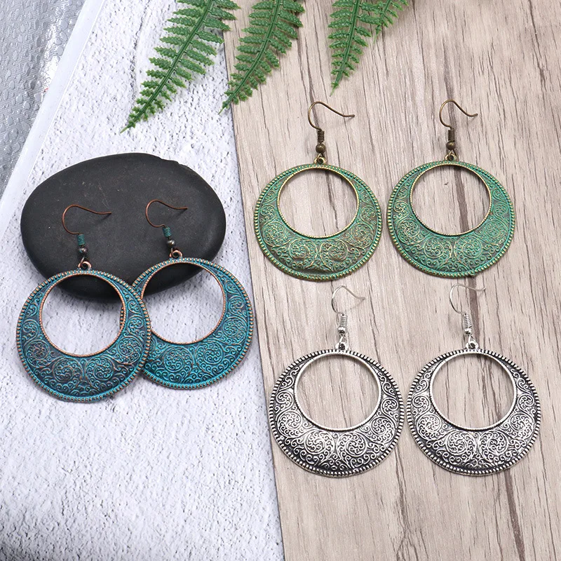 

Women's Handmade Bohemia Hollow Round Alloy Drop Earrings Carved Bronze Pattern Exaggeration New Fashion Trendy Jewelry Earrings