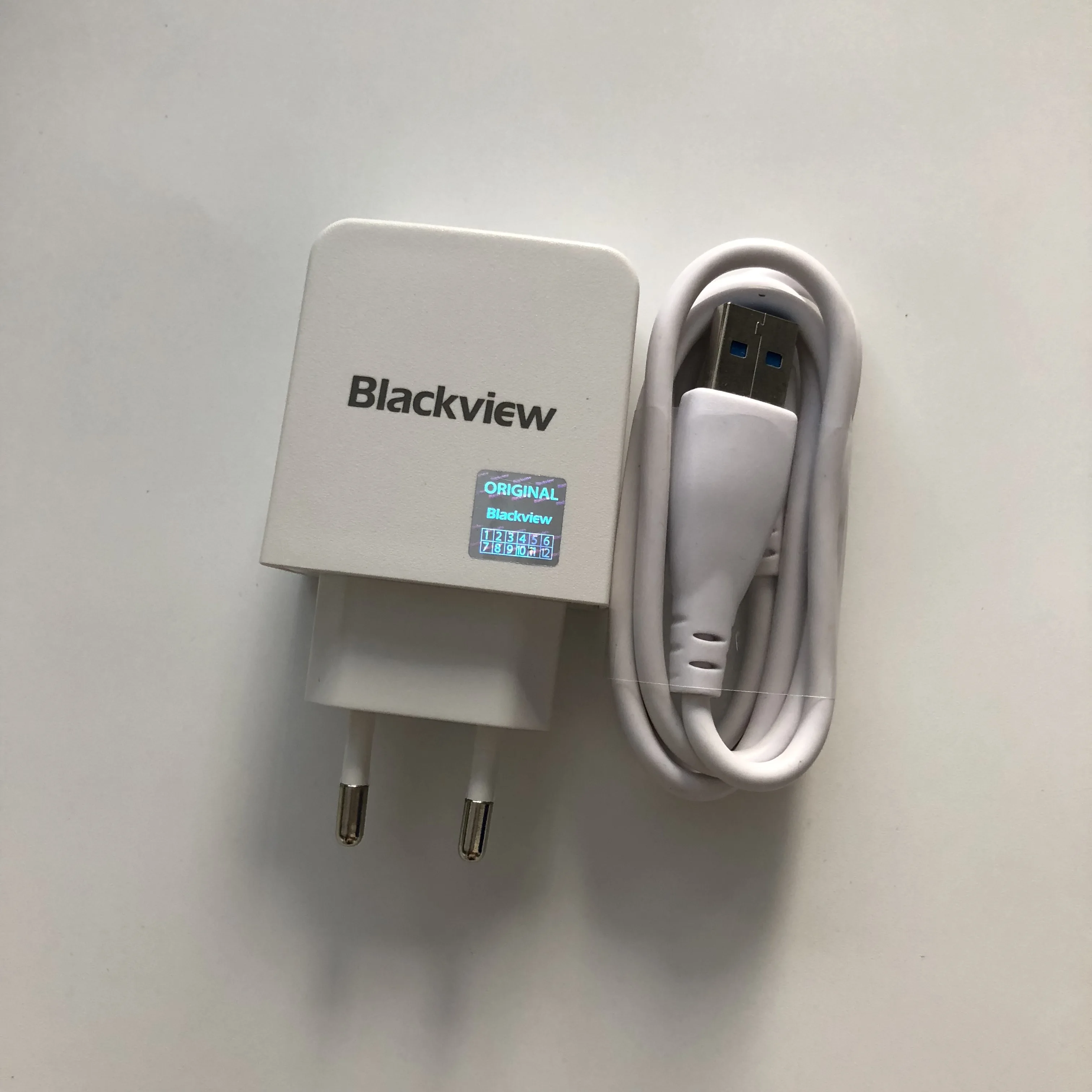 

Blackview BV6000 New Travel Charger + USB Cable USB Line For Blackview BV6000S MTK6735 Quad Core 4.7inch HD 1280*720 Smartphone