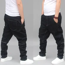 Новая мода шаровары джинсы для мужчин джинсовые брюки лоскутное размера плюс Свободные Мешковатые Черные Брюки Мужская одежда