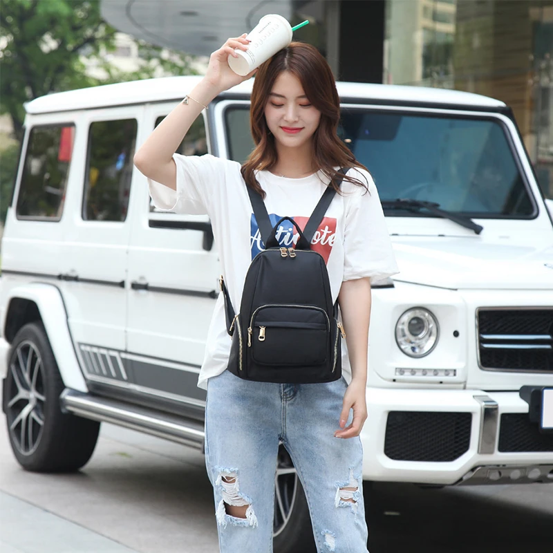 

2019 Female Soft PU Leather Mini Backpacks Students Fuzzy Ball Pendant Shoulder Schoolbags Women Fashion Small Travel Bags
