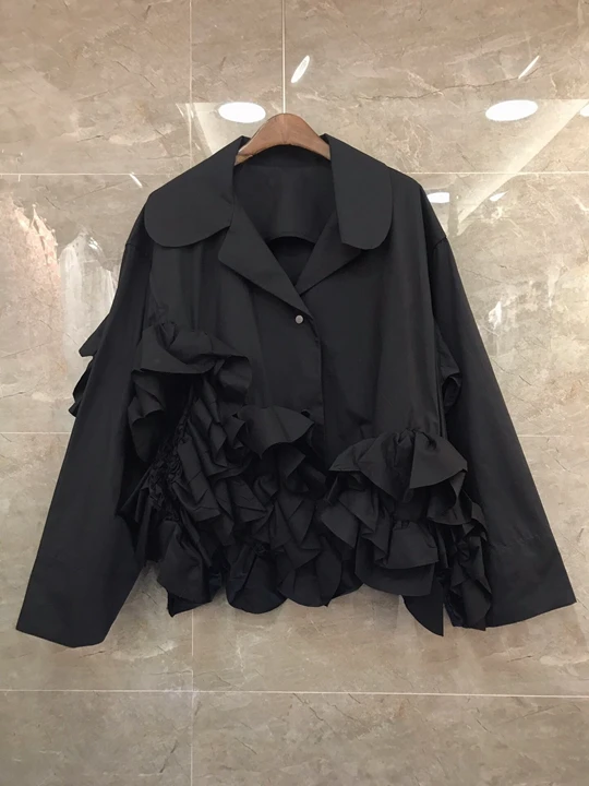

In early autumn of 2019, the new girl's small Lapel with irregular wooden ear edge stitching pure color short coat 717