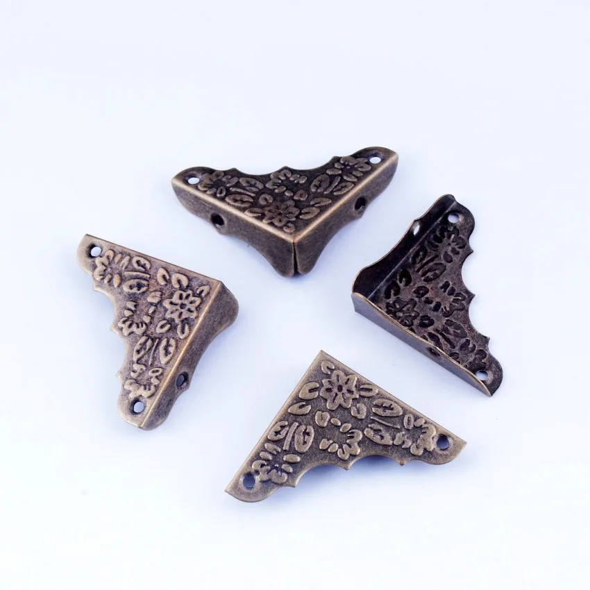 

Free Shipping-20pcs Antique Bronze Pattern Carved Metal Book Corner Albums Menus Folders Corner Protectors 37x52mm J2327