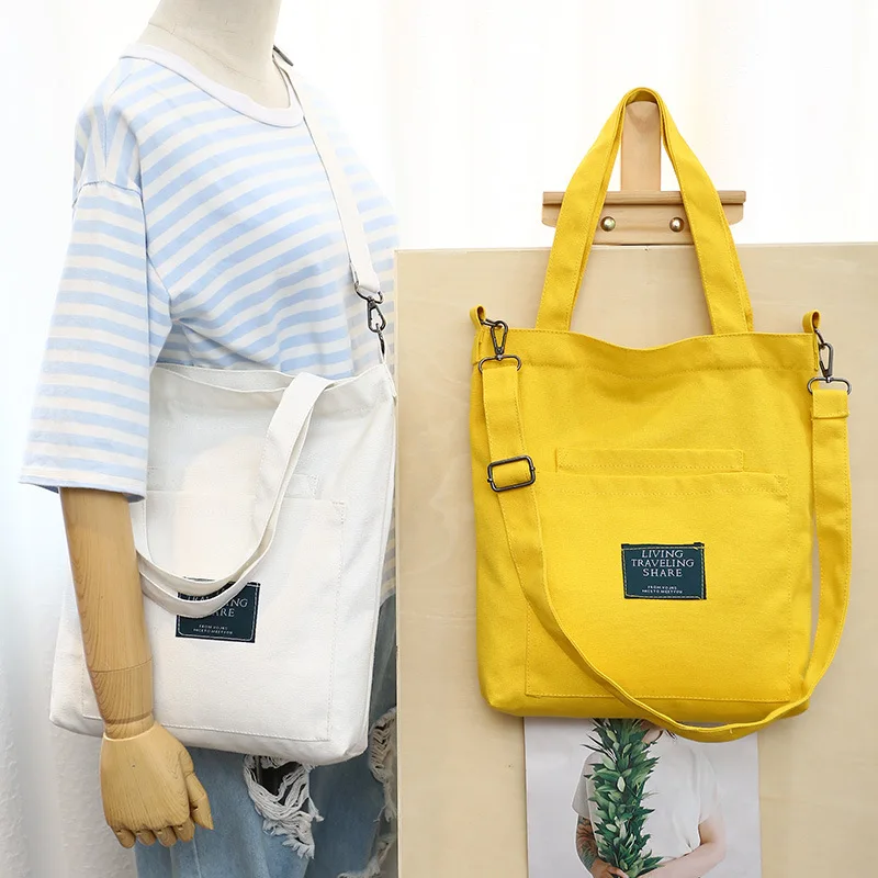 

2019 latest canvas shoulder letter pocket shoulder strap detachable casual high quality shopping to work fashion messenger bag