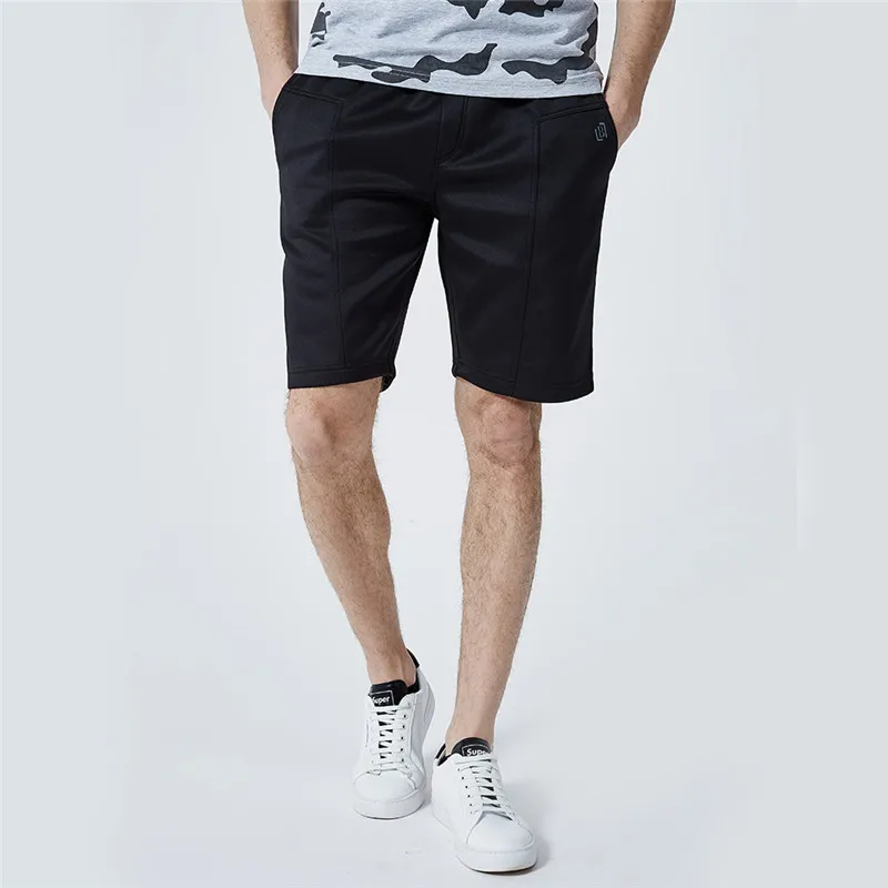 

Solid color beach shorts men mid waist casual fashion sweatpants Summer straight type outdoor short masculino streetwear WGDK50