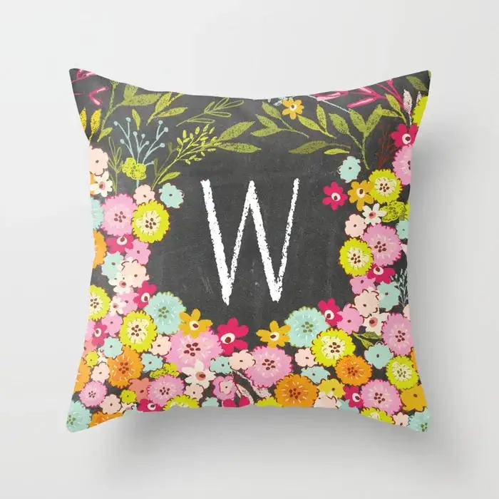 w-botanical-monogram-letter-initial-with-colorful-flowers-on-a-chalkboard-background-pillows.webp
