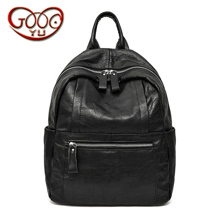 

Casual wild soft leather backpack ladies fashion Europe and the United States black sheepskin backpack solid color rivets youth