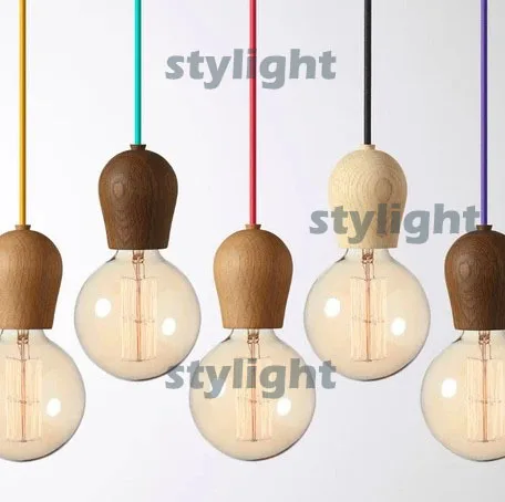

Modern BRIGHT SPROUT wood pendant lamp a fixture design by Jonas Hoejgaard Multi-clolor cord and wood cap pendant lighting